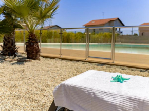 Leonardo with swimming pool and garden in Borghetto
